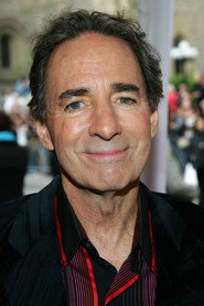 Harry Shearer isCharles Caiman